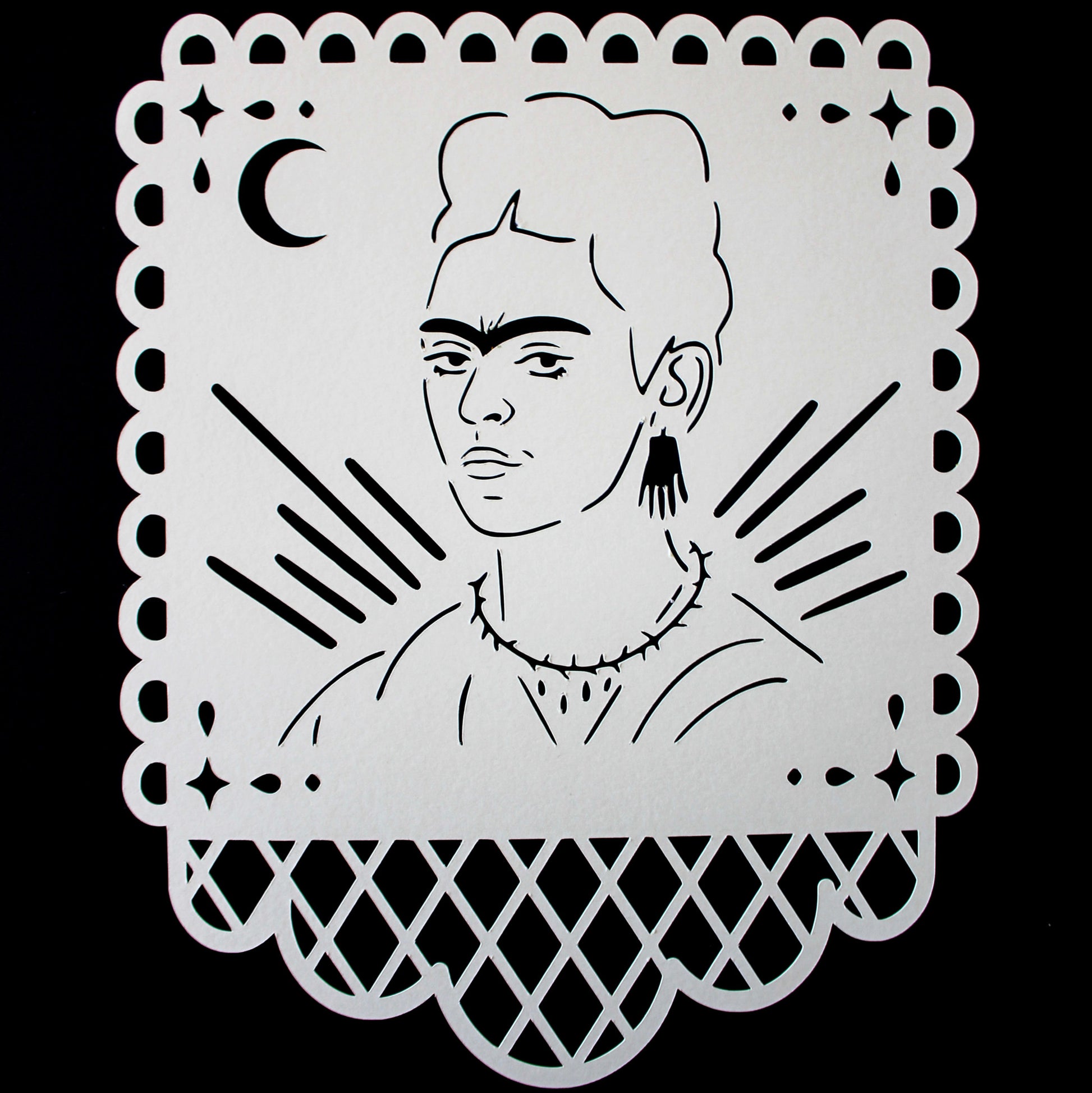 Frida Kahlo papel picado panel with rays and a moon.